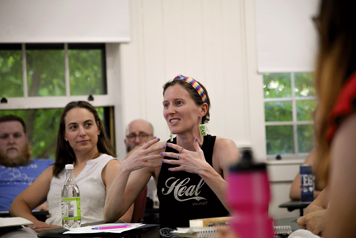 student talks during meeting