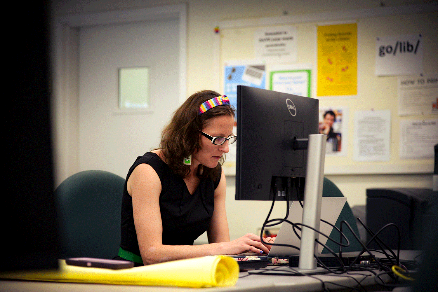 student studies at a computer