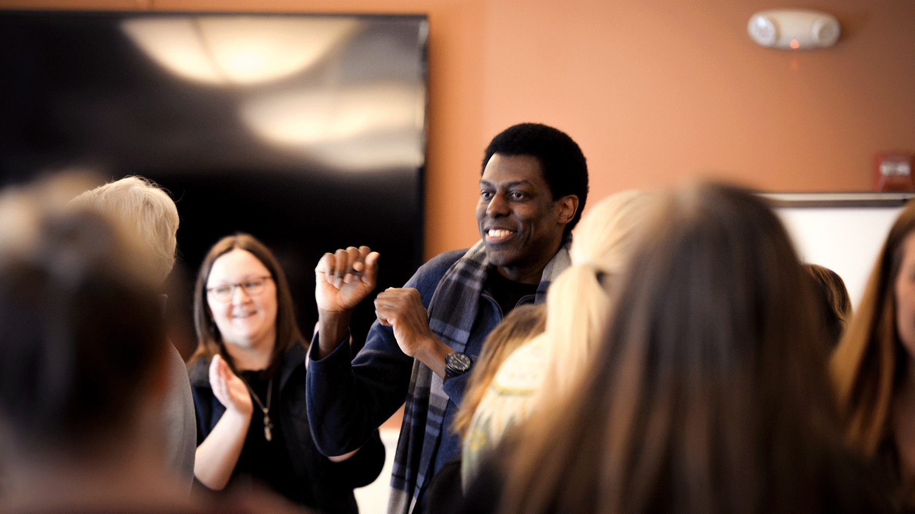 faculty and participants engaging in exercise