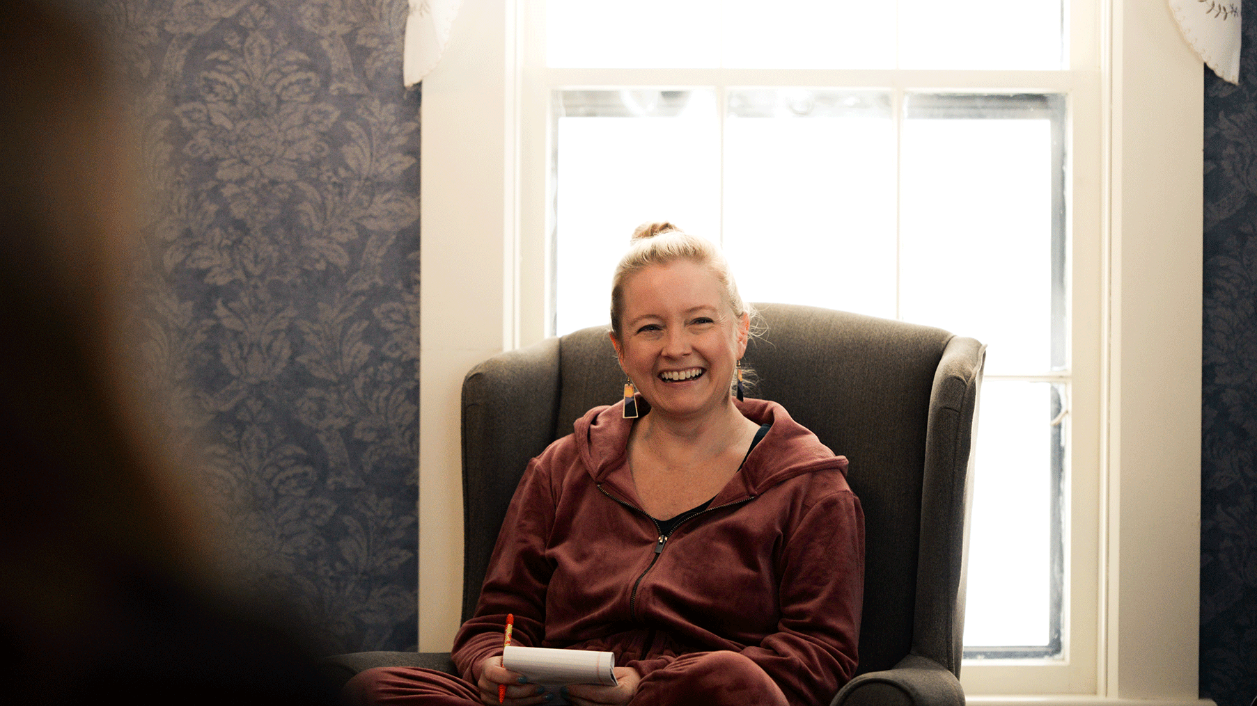 participant smiling in discussion
