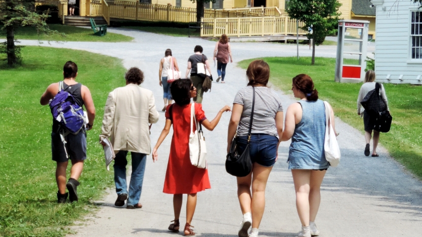 Bread Loaf student and others walk from the Inn to the Barn for afternoon classes.