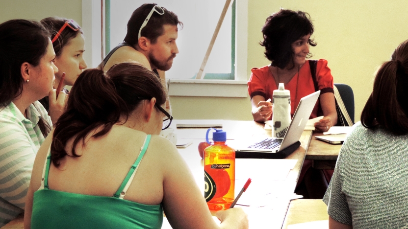 Bread Loaf student joins a discussion in class.