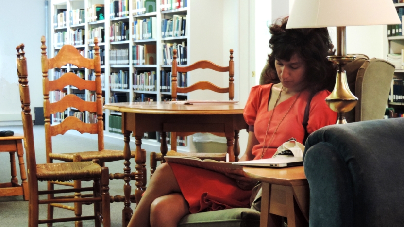 Bread Loaf student Himali Singh Soin gets some work done in the library before dinner.