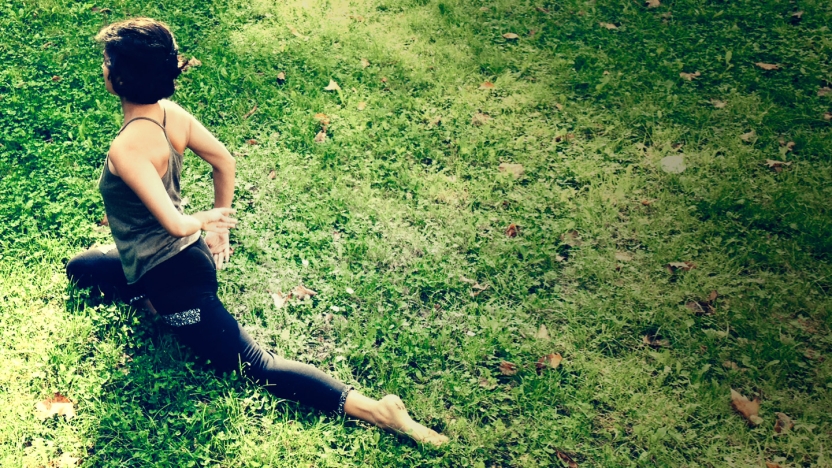 Bread Loaf student Himali Singh Soin starts her day with some stretching yoga in the fields with a view of the Green Mountains.