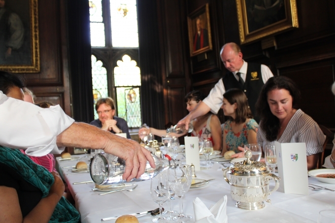 Oxford students are served during a Lincoln College High Table dinner.