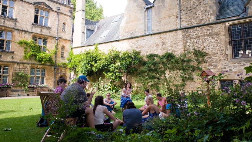Students having class outside at Oxford.
