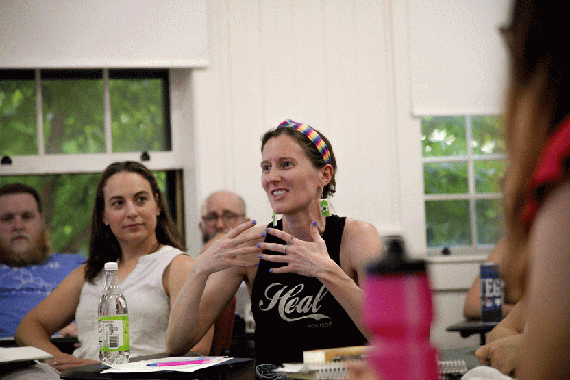 student talks during meeting