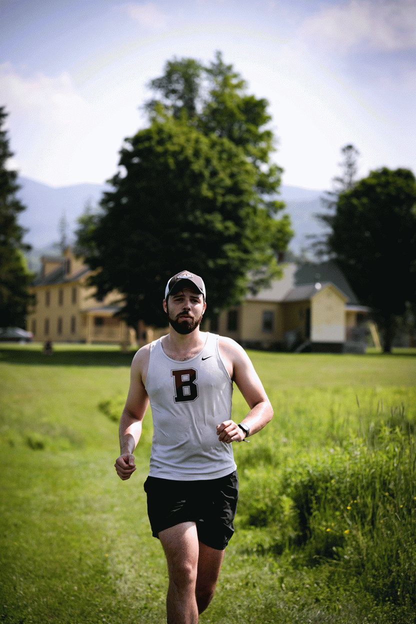 student jogs on Bread Loaf campus