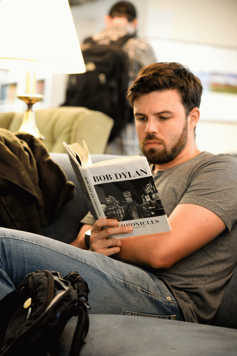 student reads in Bread Loaf library