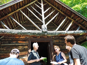Four BLSE students standing outside the BLSE cabin in Ripton, Vermont