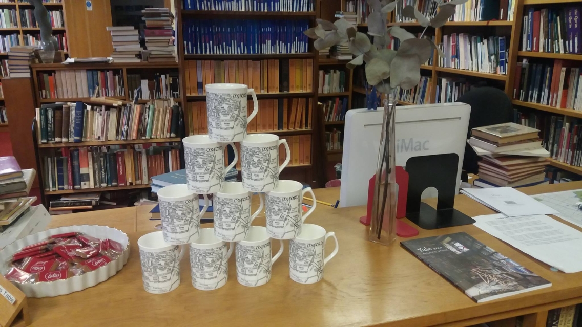 Mugs stacked in a pyramid