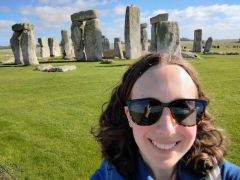 A student taking a selfie at Stonehenge 