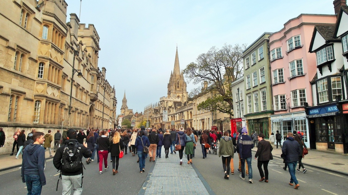 Crowds fill Oxford High Street following the performance by the choir at Magdalen College.