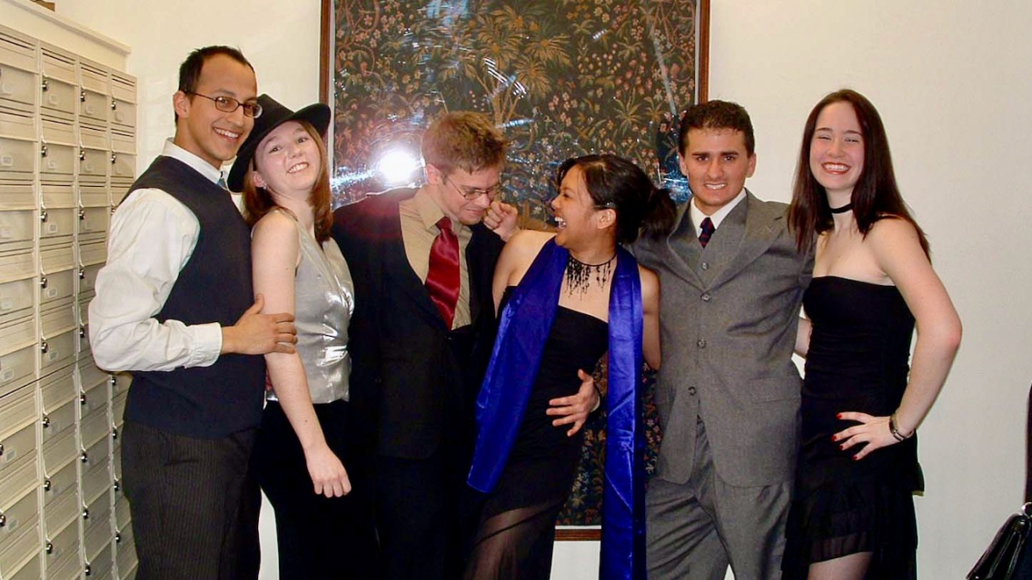 Students pose in their finery before heading to prom.