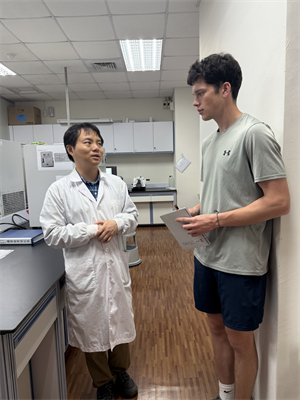 Chris and supervisor at College of Medicine internship.