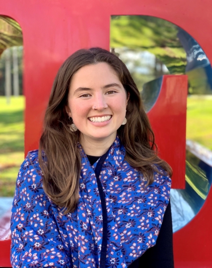 Headshot of a smiling person