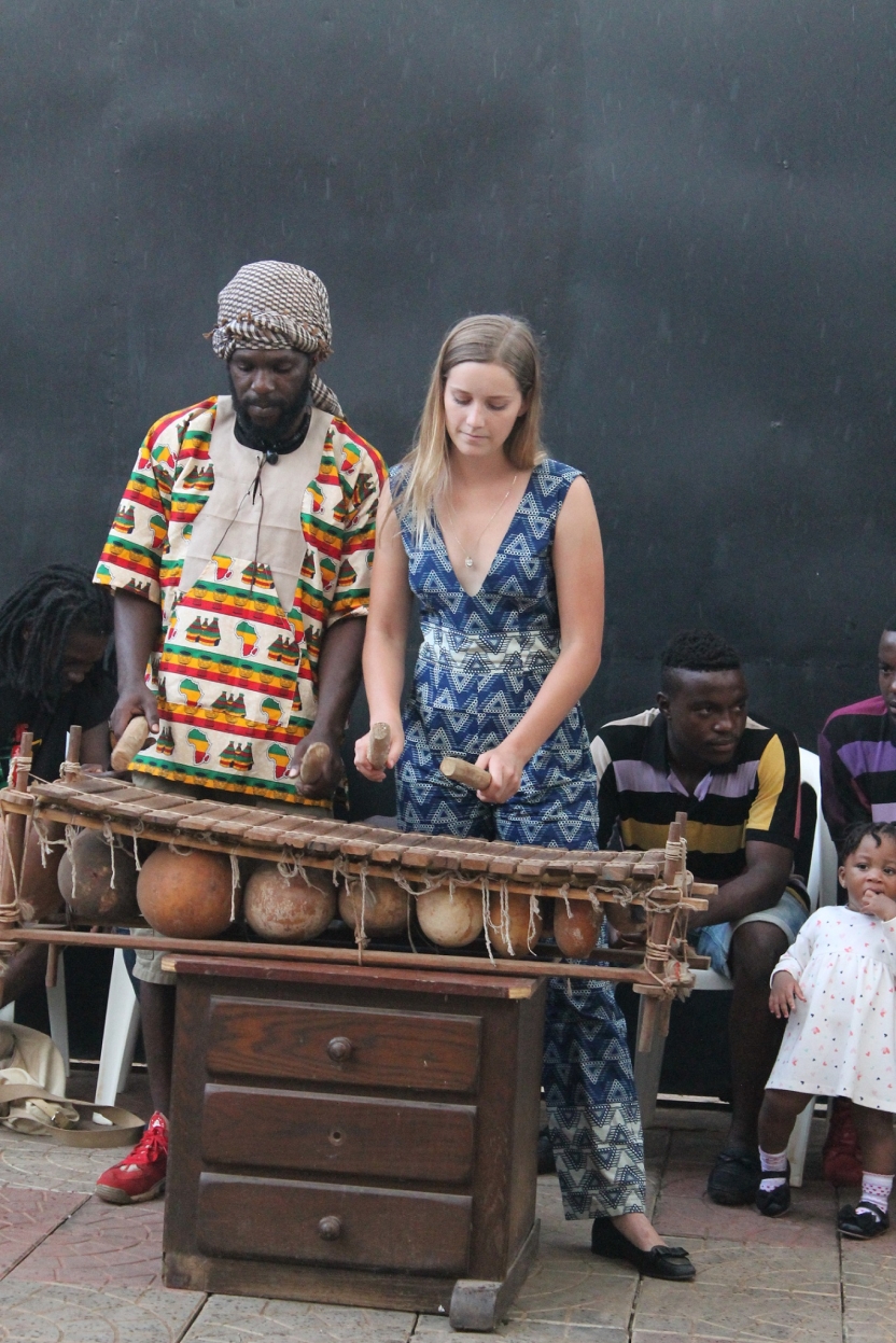 A student and her mentor play the balafon