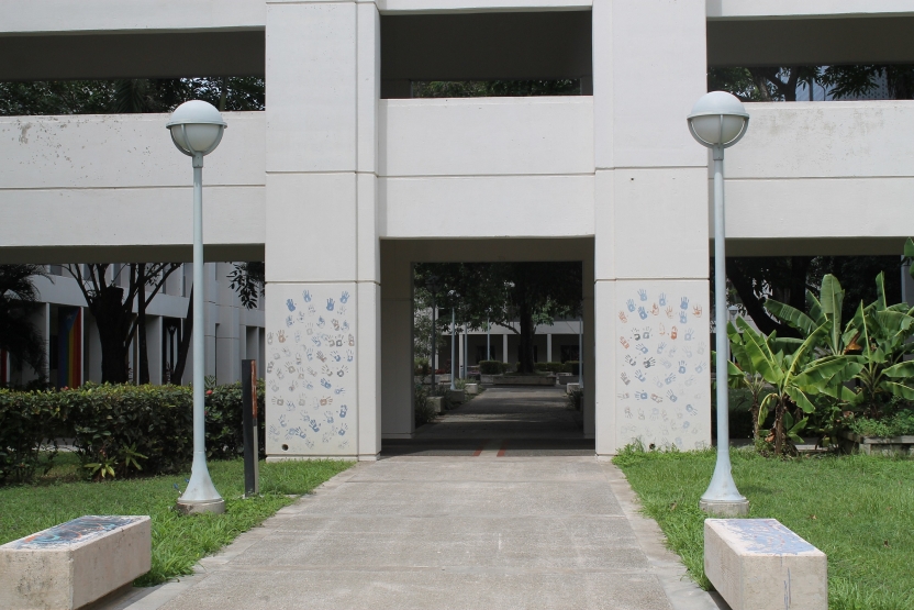 The outside of a building, with handprint art