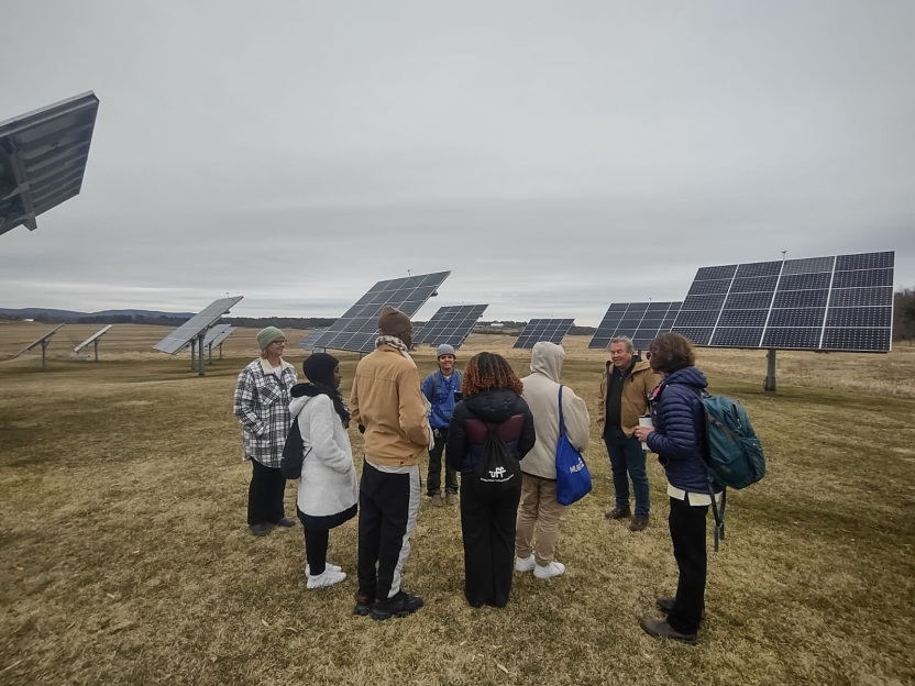 Students getting a tour of a solar farm