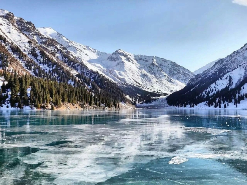 A mountain and a frozen lake
