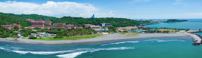 A photo fo National Sun Yat-Sen University from above the water.