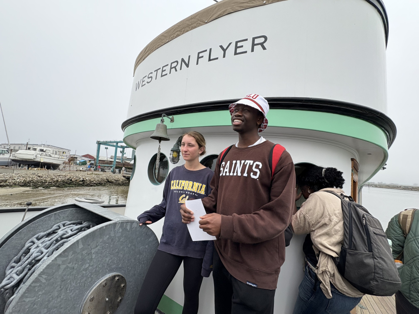 Students standing on the deck of the Western Flyer boat