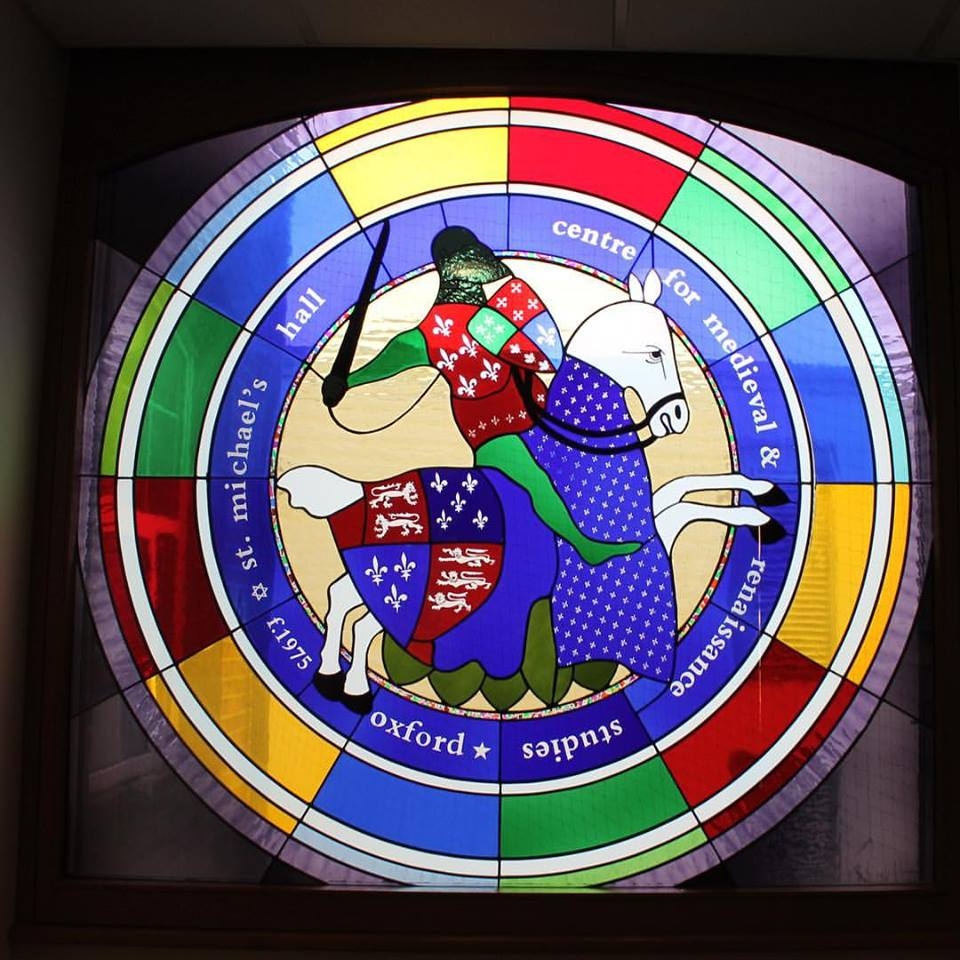 The CMRS logo on a stained glass window