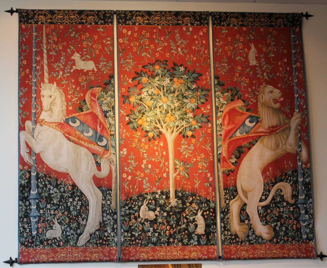 A tapestry with a lion and a unicorn