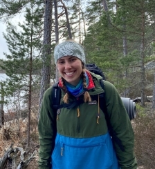 Student smiling with a backpack on