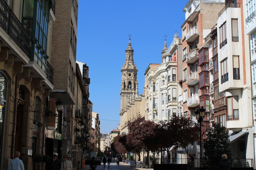 City street with a tower in the background