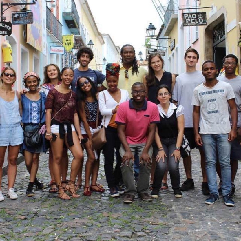 Students smiling together on an excursion to Salvador