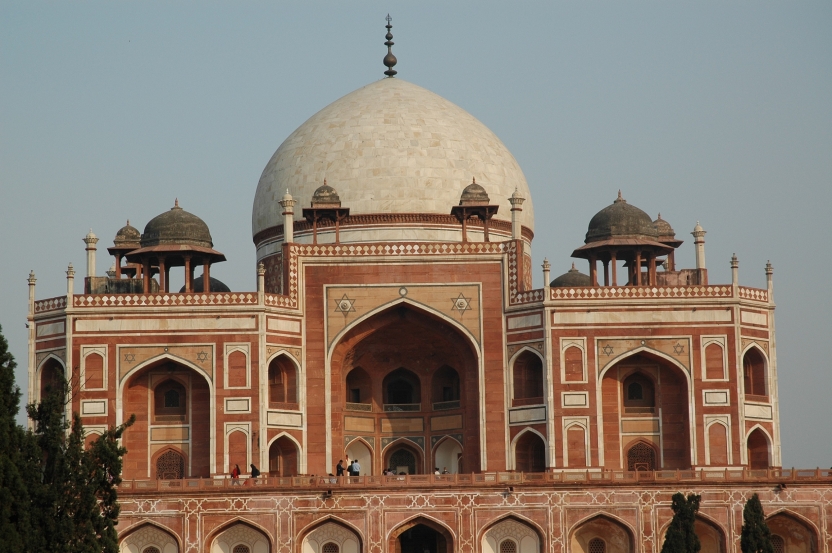 A large domed building housing a tomb