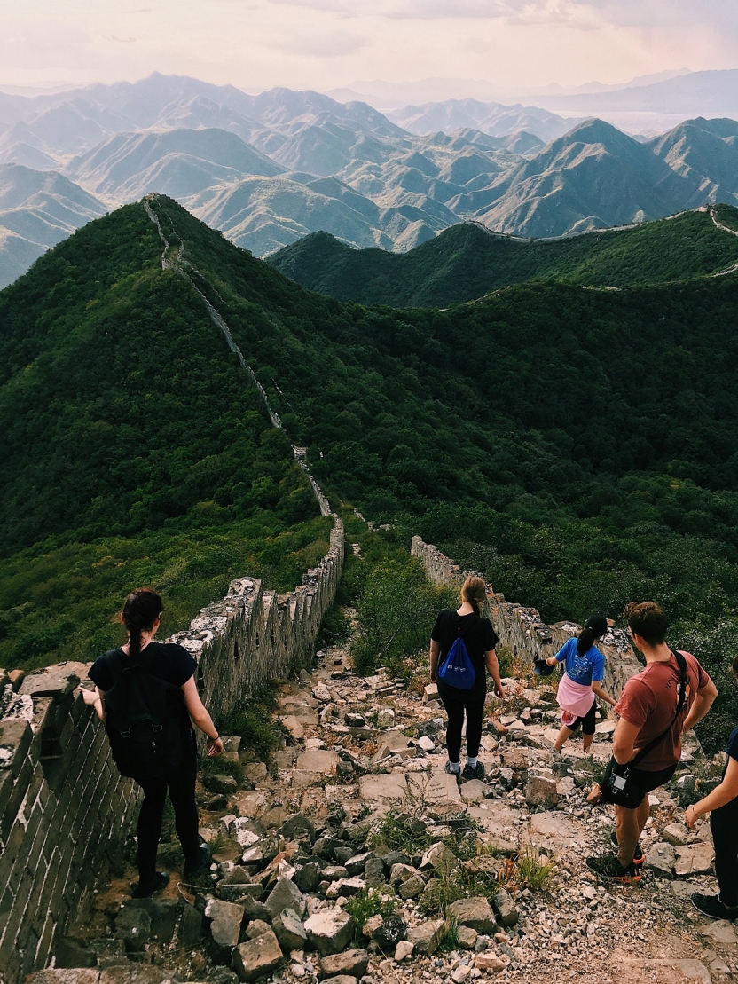 Students descending stairs on the Great Wall of China
