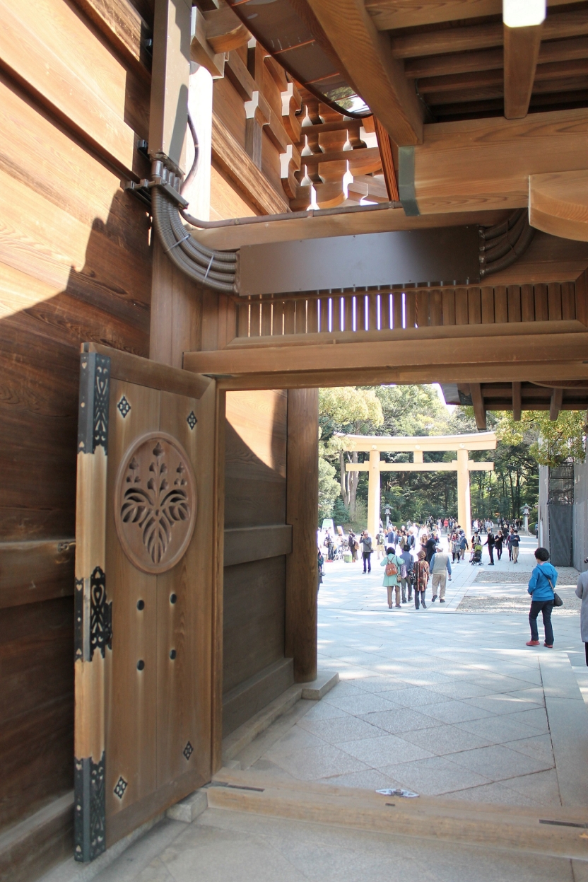 An open door with a torii gate on the other side