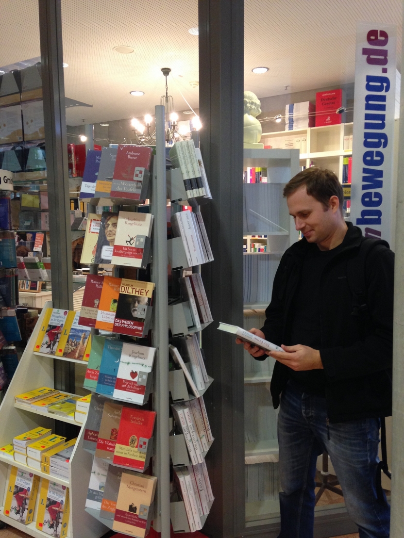 A student looks at books in the university