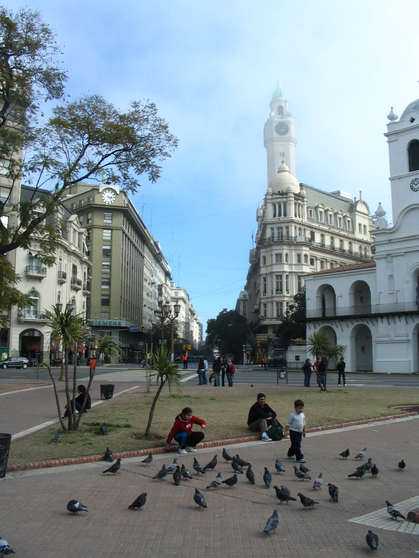 Children and pigeons in Plaza de Mayo, Buenos Aires