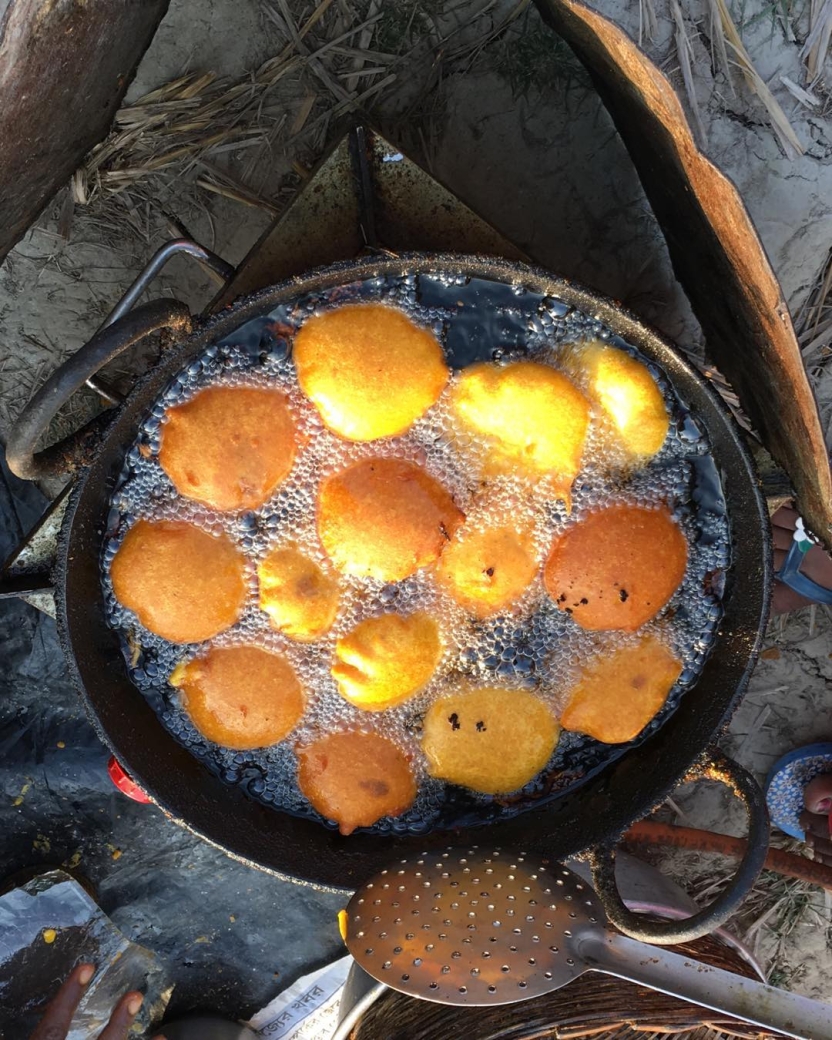A pan of deep fried potatoes