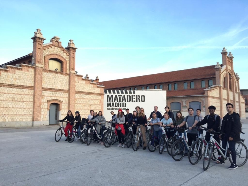 Students biking around the Matadero of Madrid.