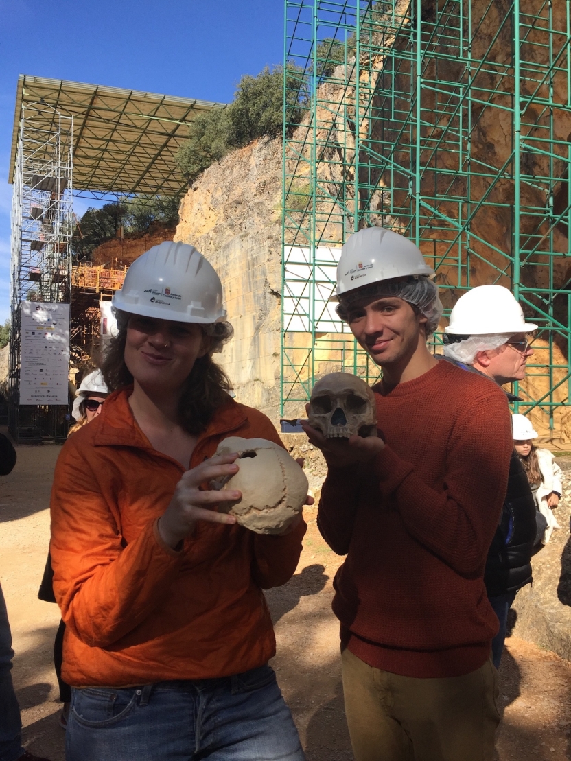 Students holding skulls in Atapuerta.