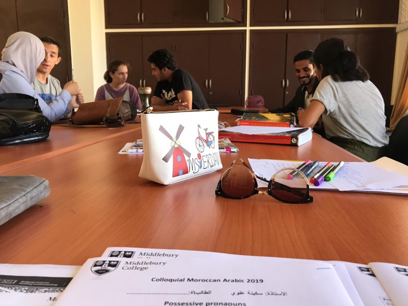 View of students in Moroccan Colloqial Arabic class chatting with Moroccan peers.