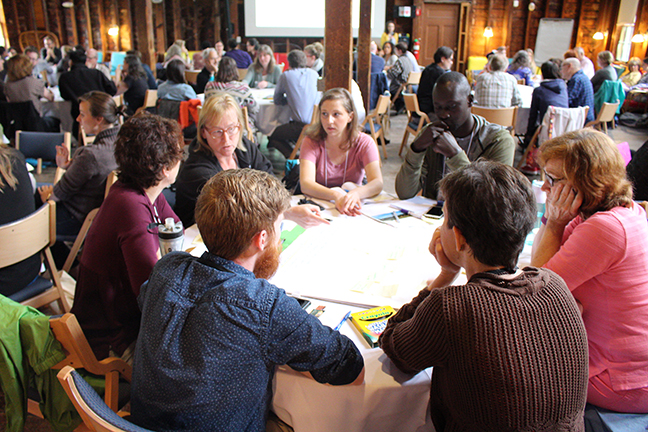 Discussion group at June Forum in the Barn