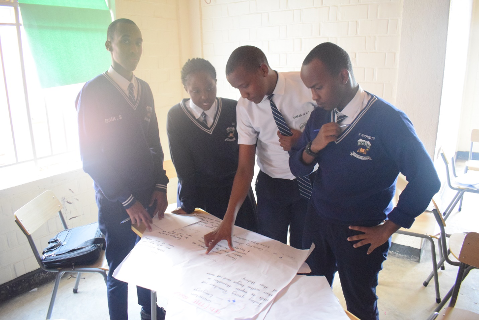 students working on final presentation