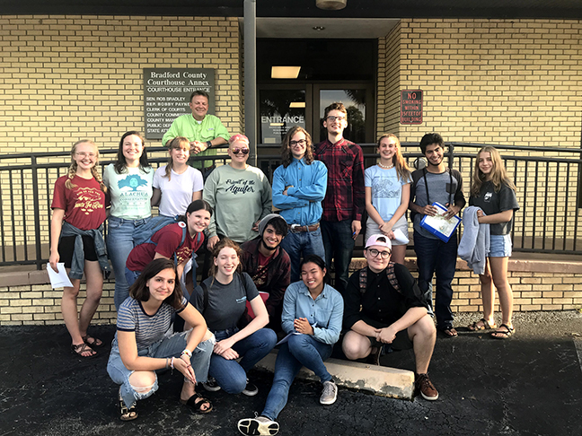 The Young Leaders for Wild Florida stand outside of the County Commission of Bradford County, Florida