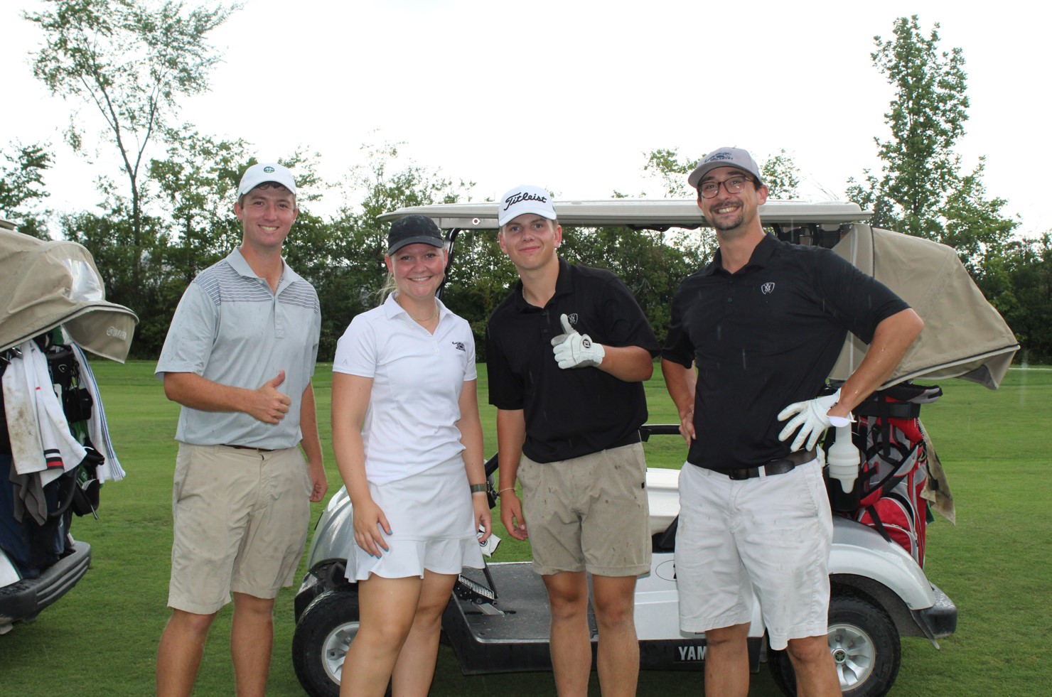 team photo from employee golf tournament