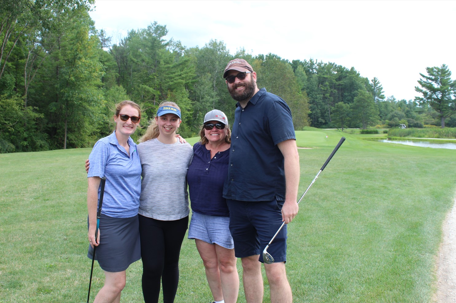 team photo from employee golf tournament