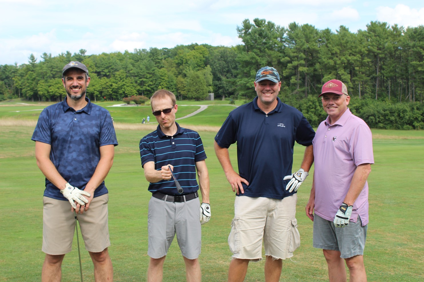 team photo from employee golf tournament