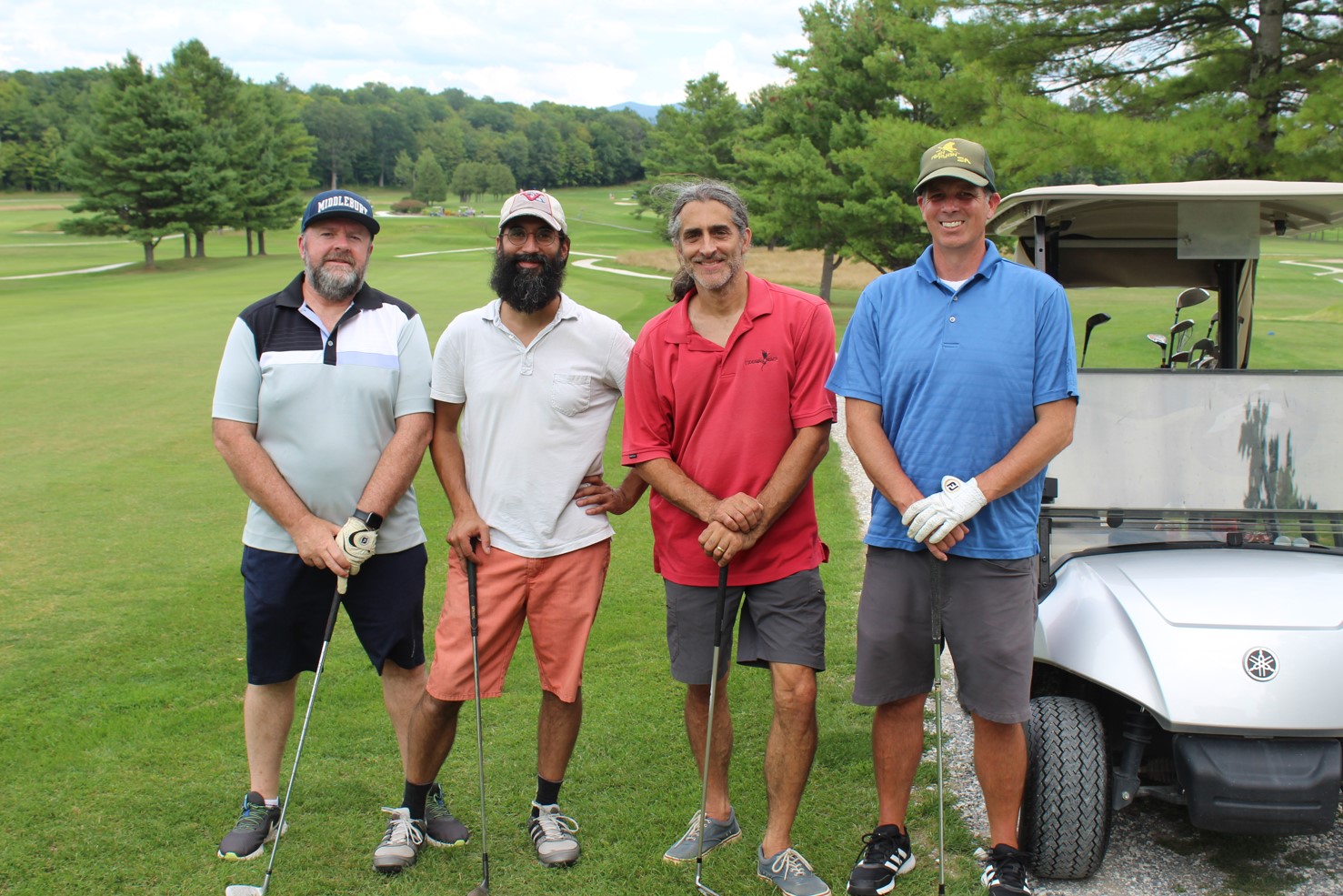 team photo from employee golf tournament