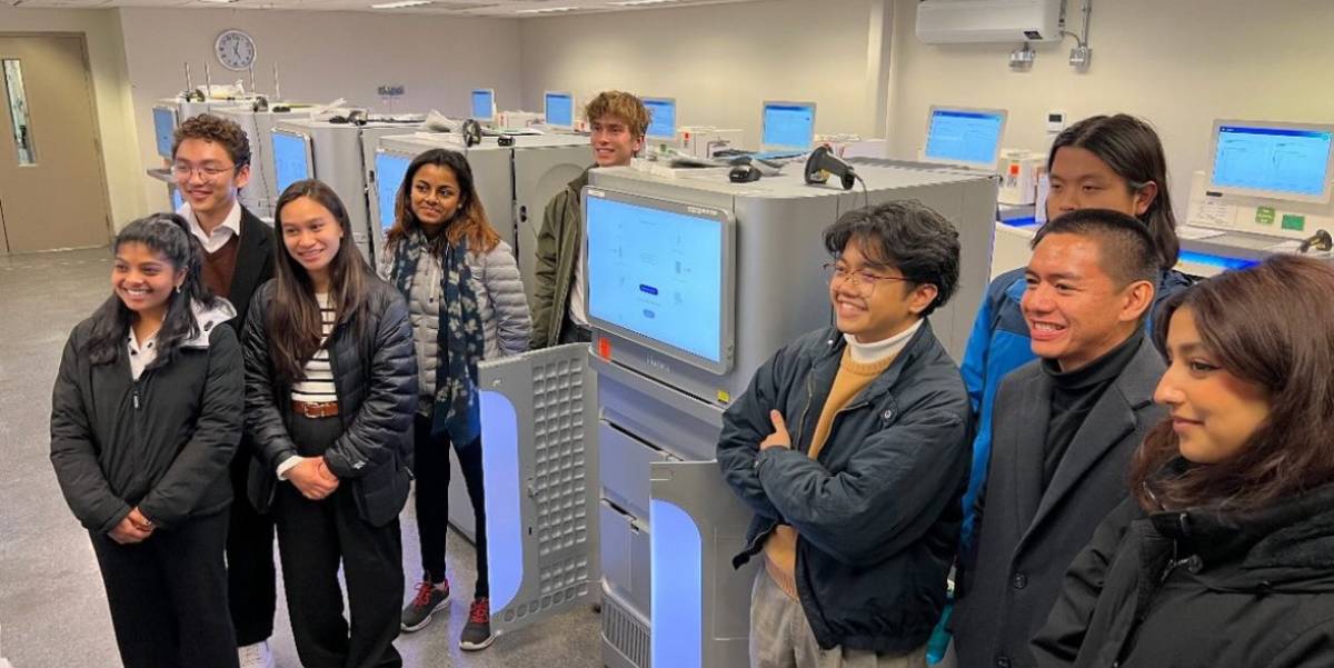 Students pose with the CRISPR at the Broad Institute