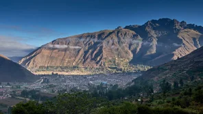 A town in a valley surrounded by rugged mountains.
