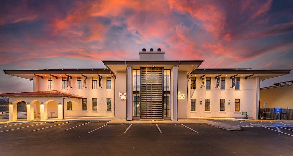 The Munras residence hall at twilight 